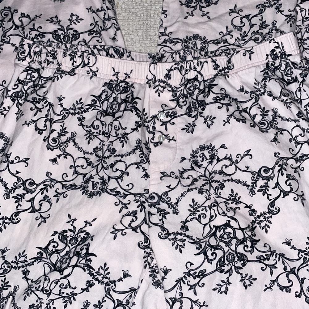 Victoria’s Secret pajama bottoms. Pink and black print. Small